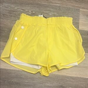 ZYIA Yellow Athletic Shorts with Curved Hem